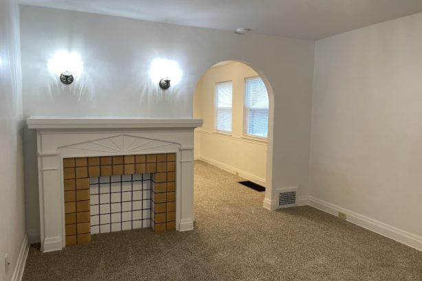 Living Room with Decorative Fireplace