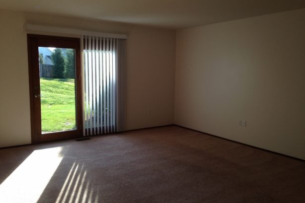 Living Room with door to Private Patio