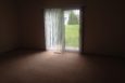 Living Room with Door to Private Patio